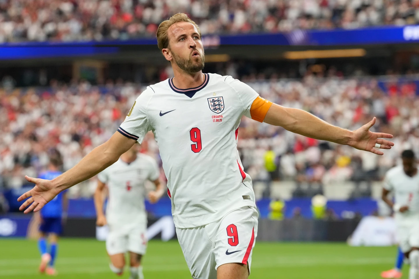 Harry Kane celebrates after scoring for England against Croatia.