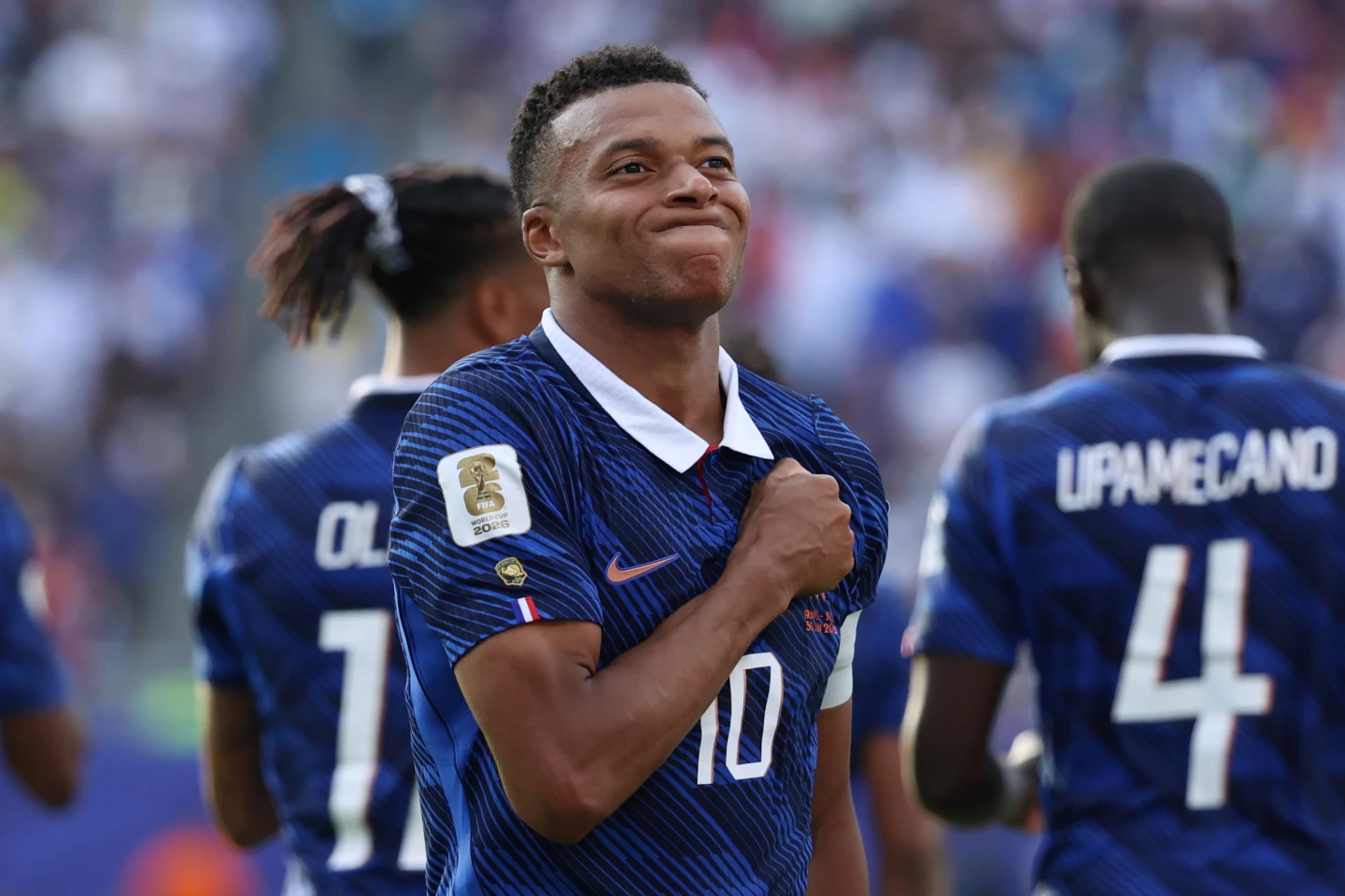 Kylian Mbappé celebrates after scoring for France against Sweden.