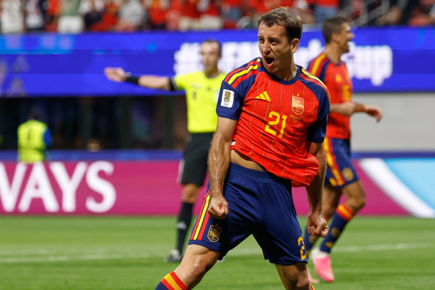 Mikel Oyarzabal celebrates after scoring for Spain against Saudi Arabia.